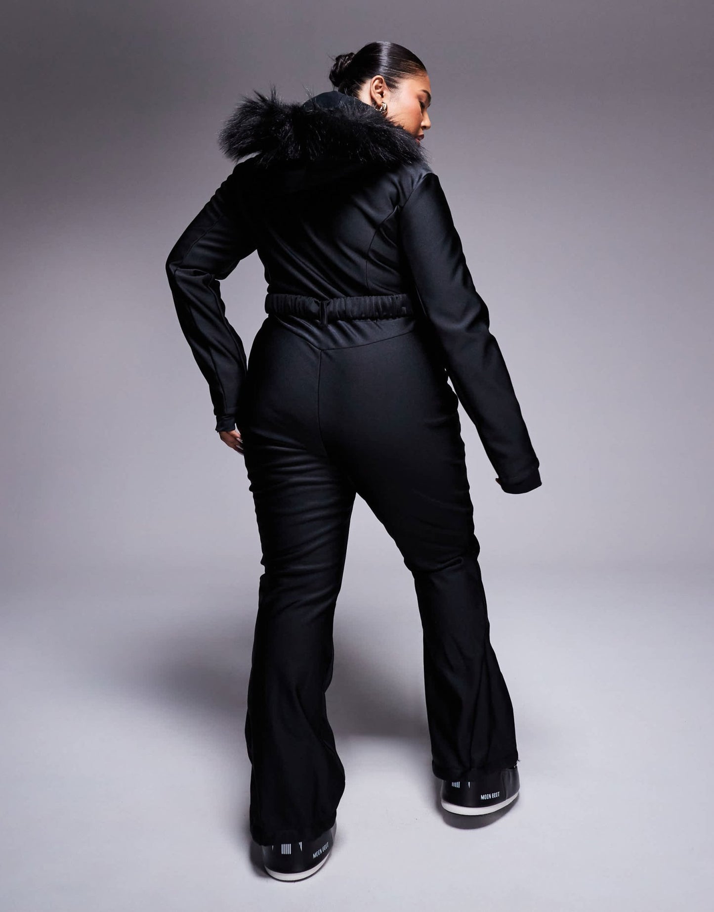 4505 Curve Ski belted ski suit with slim kick leg and faux fur hood in black gloss - ASOS Sample Sale EU Store