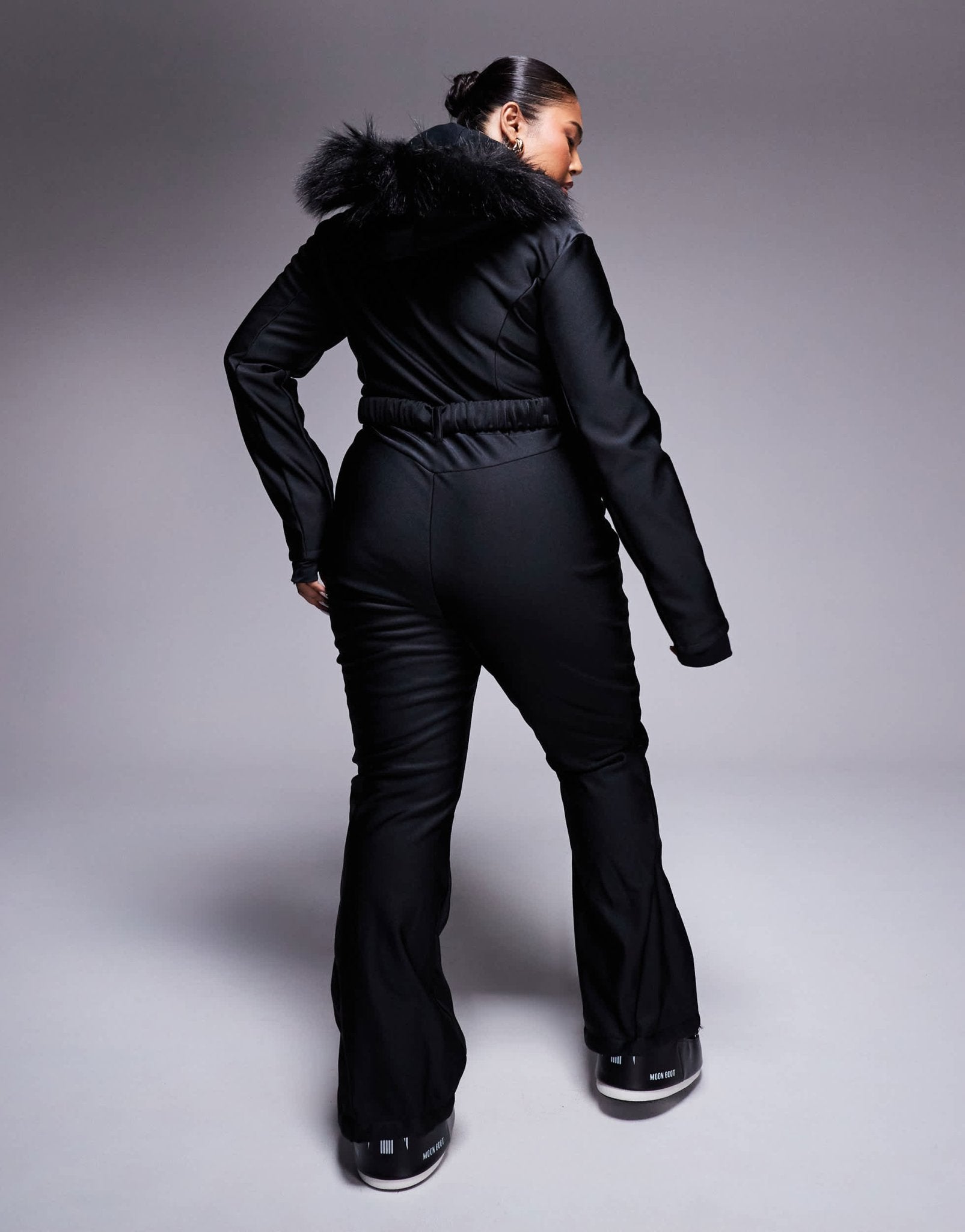 4505 Curve Ski belted ski suit with slim kick leg and faux fur hood in black gloss - ASOS Sample Sale EU Store