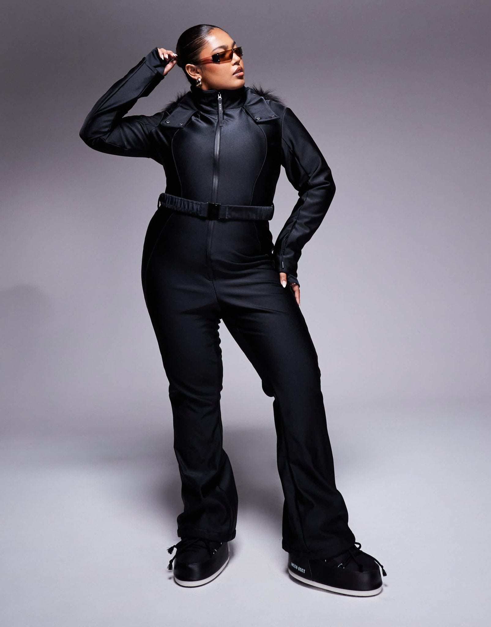 4505 Curve Ski belted ski suit with slim kick leg and faux fur hood in black gloss - ASOS Sample Sale EU Store