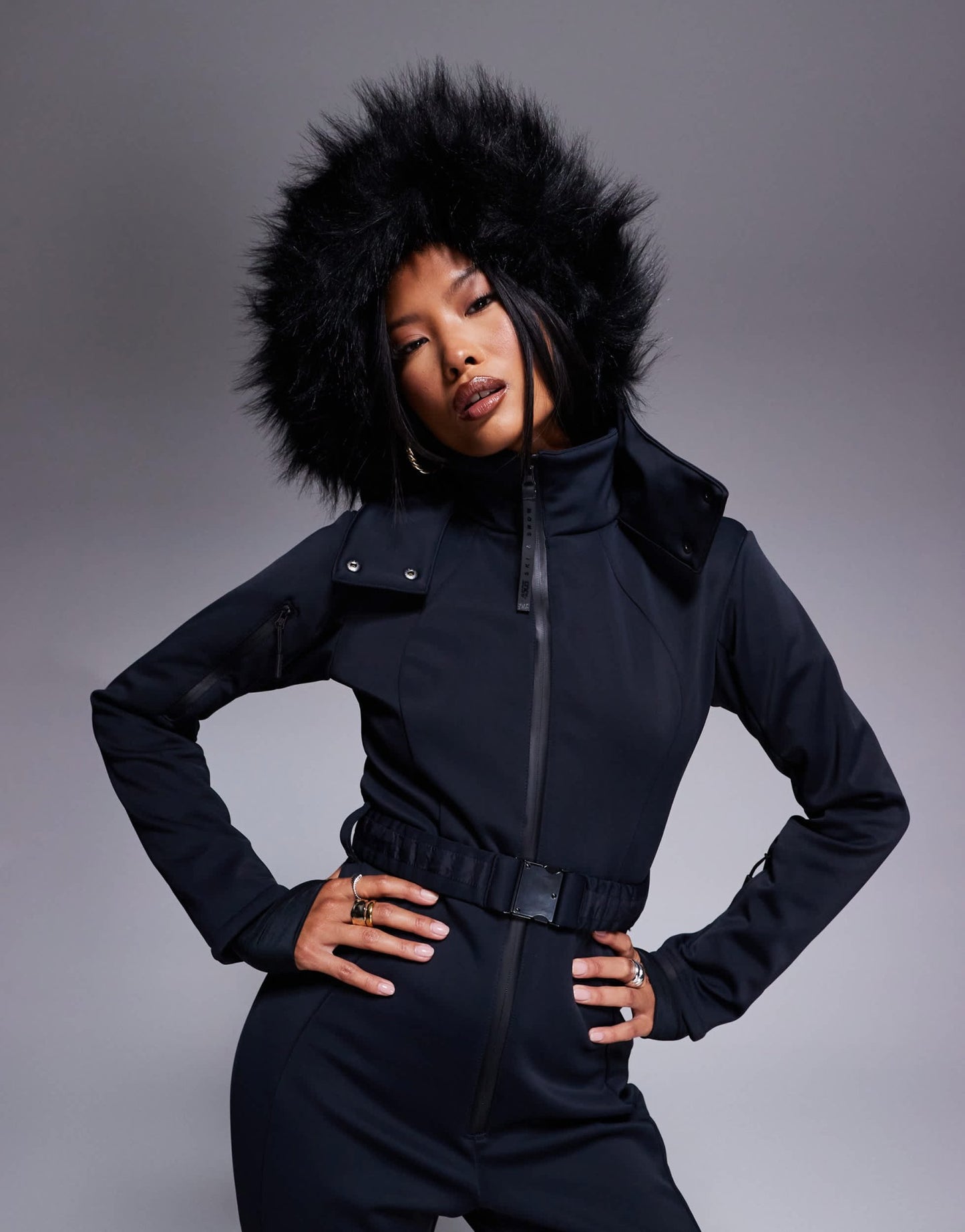 4505 Petite Ski belted ski suit with slim kick leg and faux fur hood in black - ASOS Sample Sale EU Store