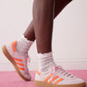 adidas Originals Handball Spezial trainers in pink and orange