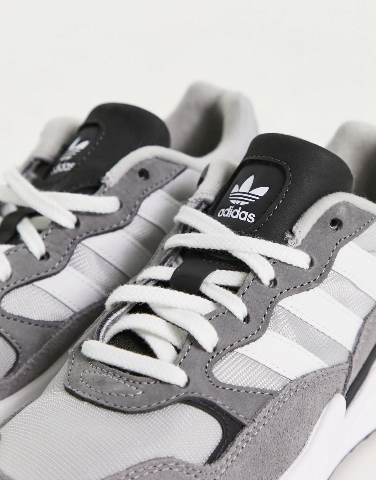 adidas Originals Retropy Adisuper trainers in grey and white - ASOS Sample Sale EU Store