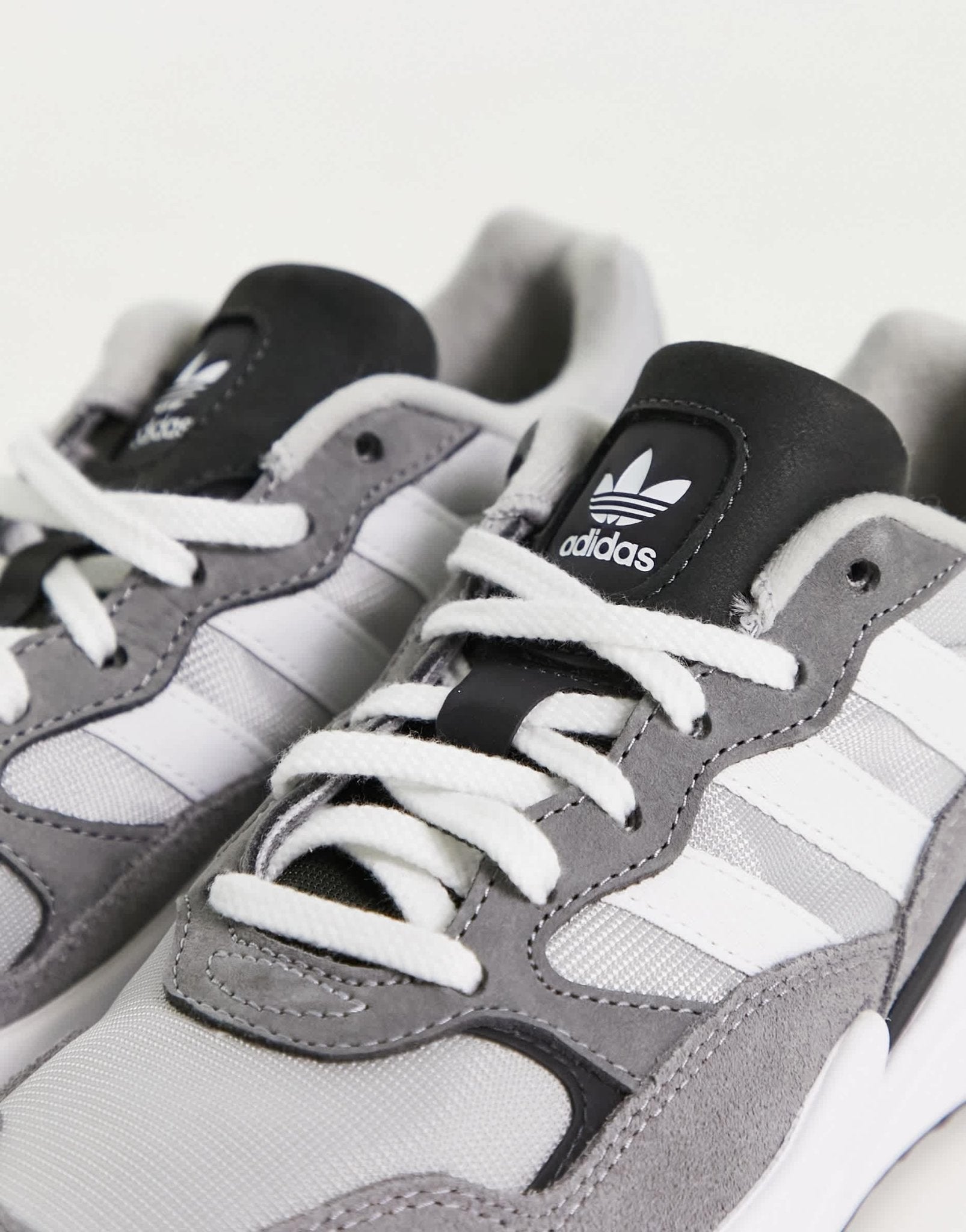 adidas Originals Retropy Adisuper trainers in grey and white - ASOS Sample Sale EU Store