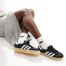 adidas Originals Sambae trainers in black and white