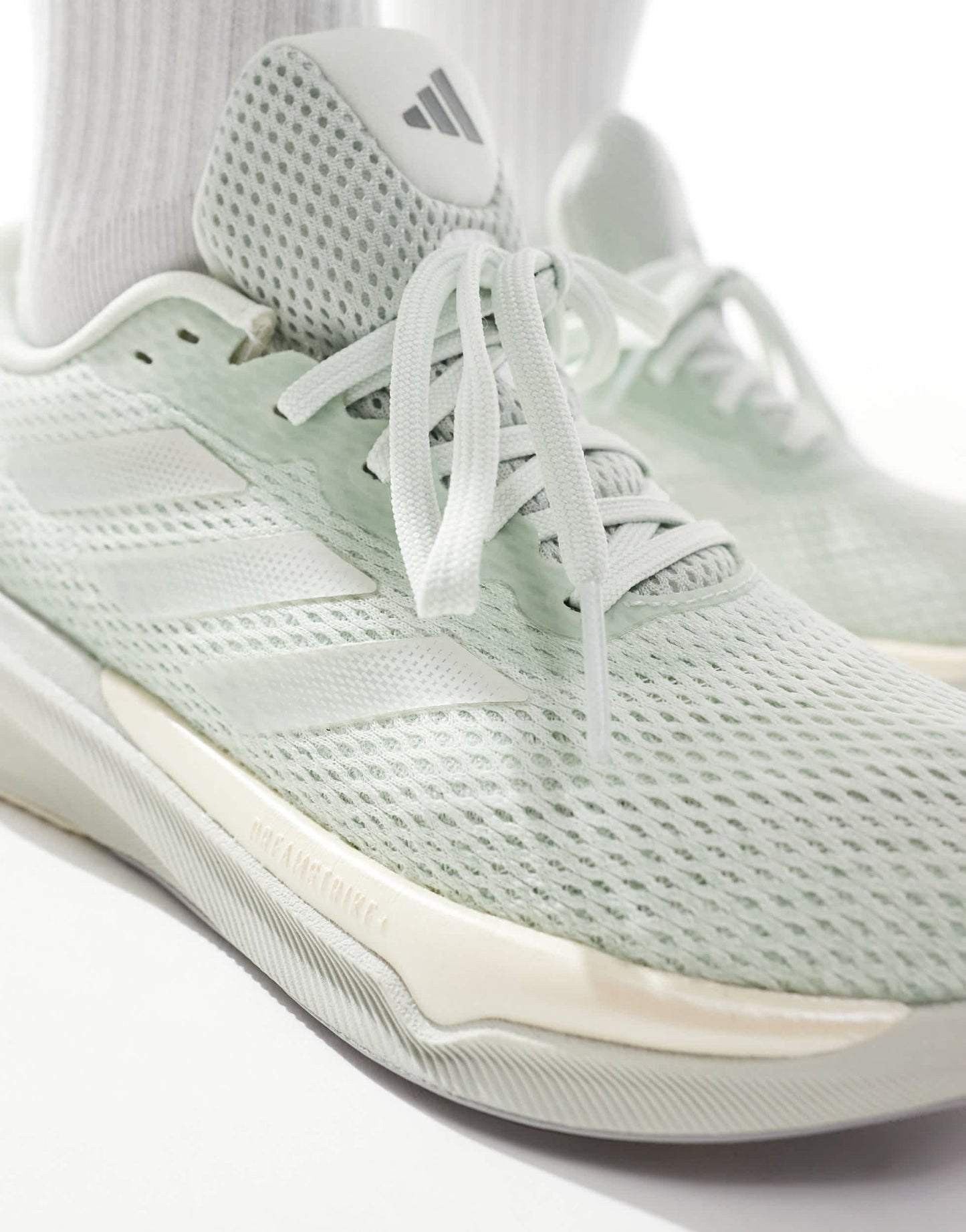 adidas Running Supernova Stride trainers in pale green - ASOS Sample Sale EU Store