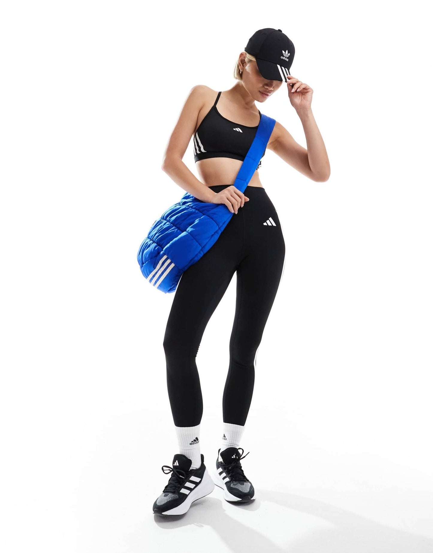 adidas Training Essentials light support 3 stripe sports bra in black - ASOS Sample Sale EU Store