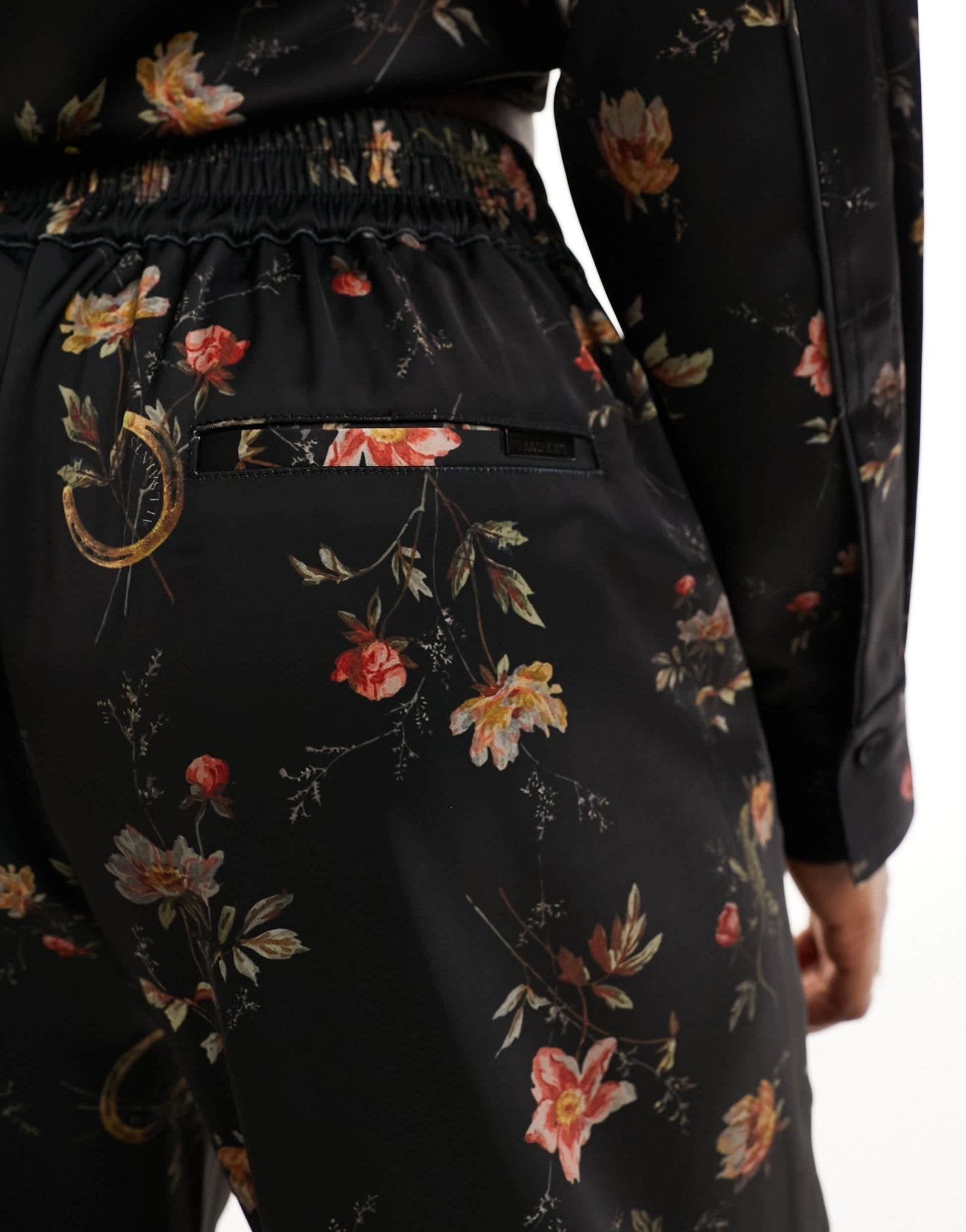 AllSaints Louisa Tanana trousers in black floral - ASOS Sample Sale EU Store