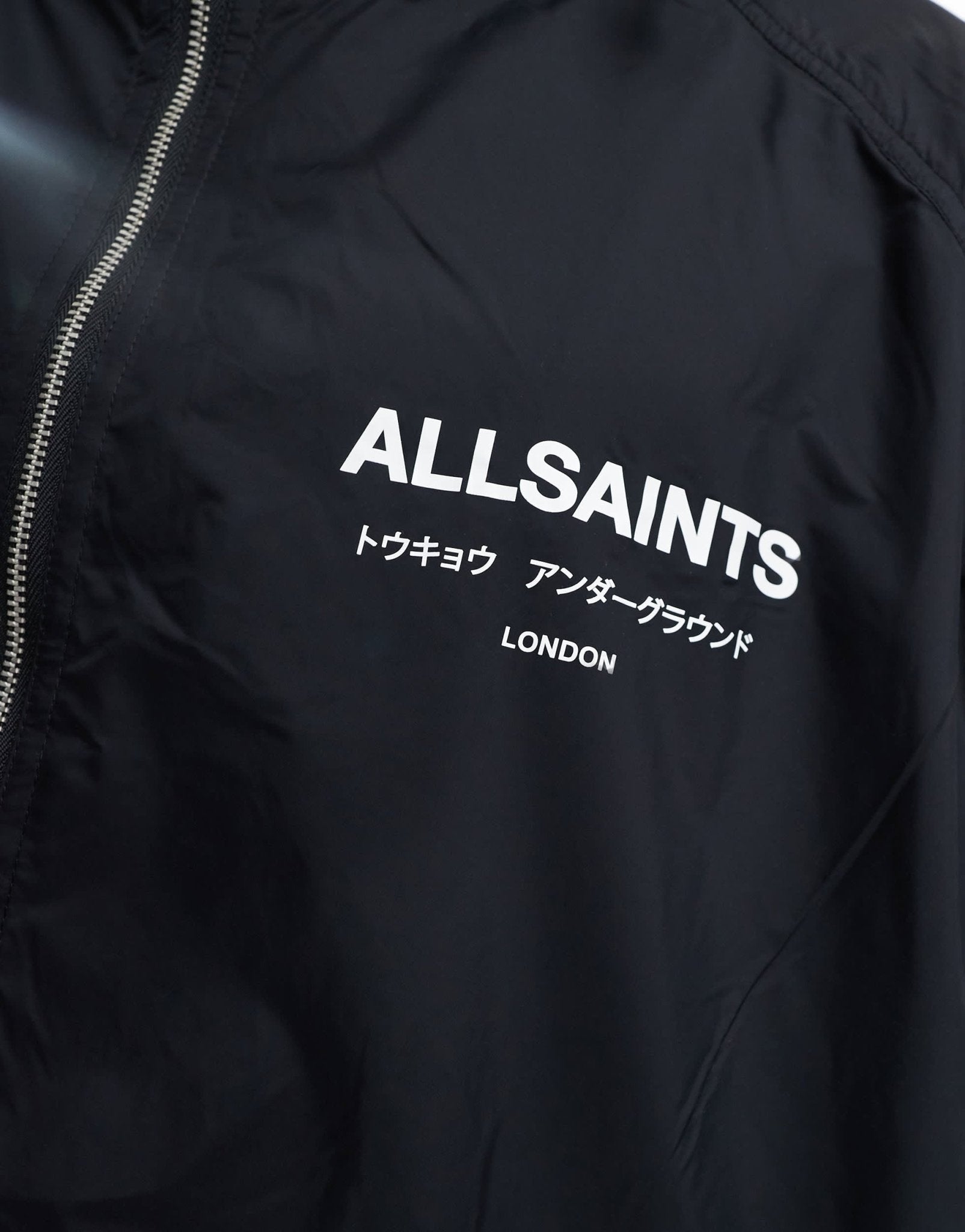 AllSaints Underground unisex lightweight jacket with water resistant finish in black - ASOS Sample Sale EU Store