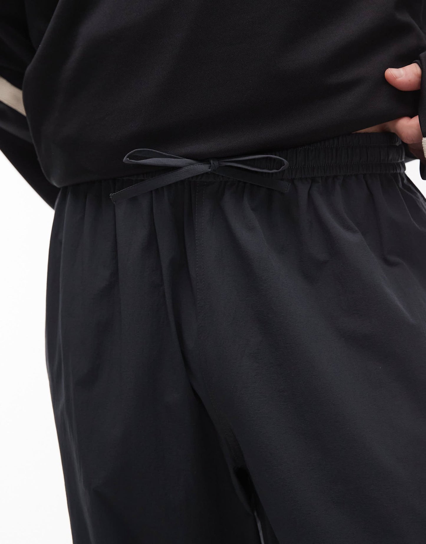 ARKET tech nylon relaxed trouser with drawstring waist in dark grey - ASOS Sample Sale EU Store