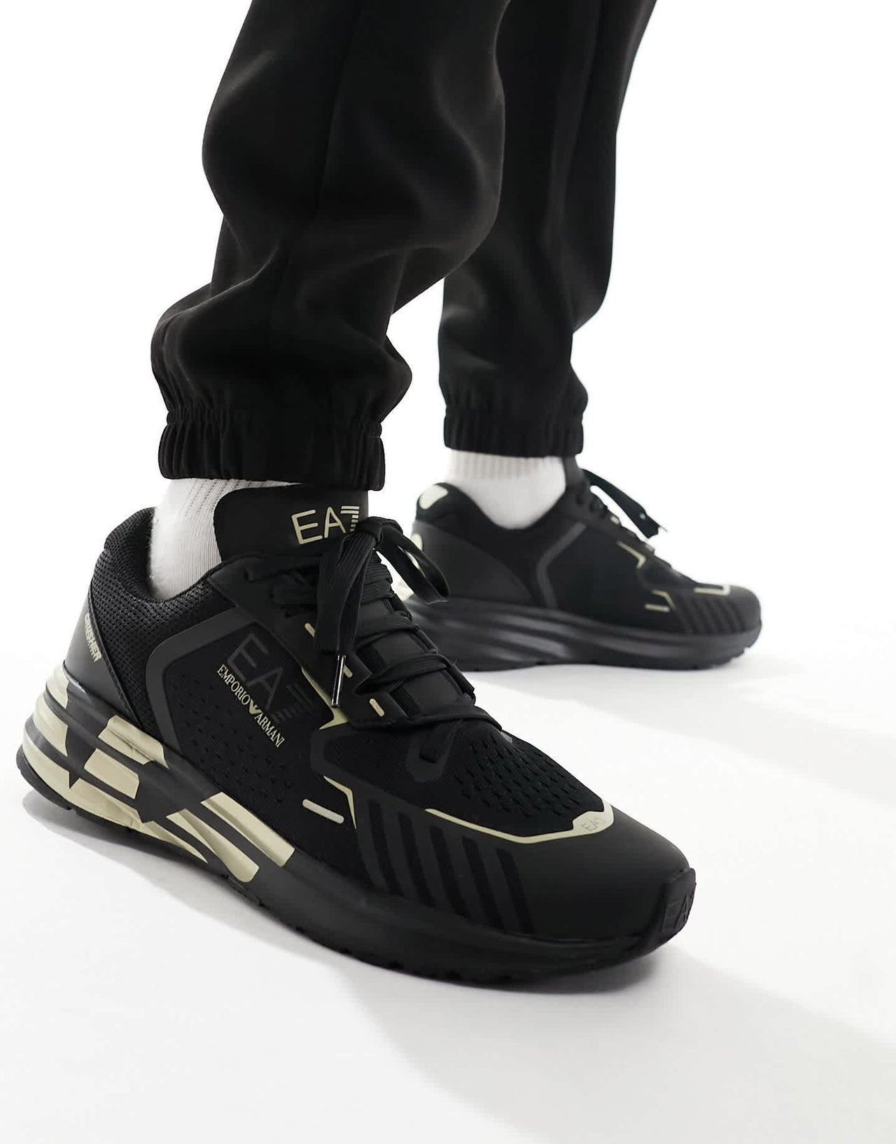 Armani EA7 gold logo flyknit nylon mesh trainer in triple black/gold - ASOS Sample Sale EU Store