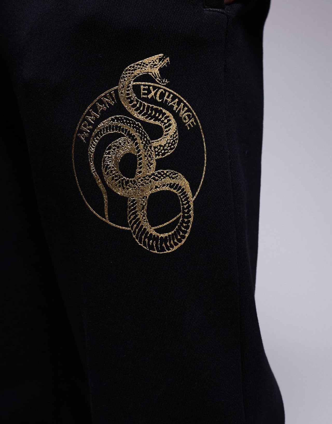Armani Exchange lunar capsule snake joggers in black - ASOS Sample Sale EU Store