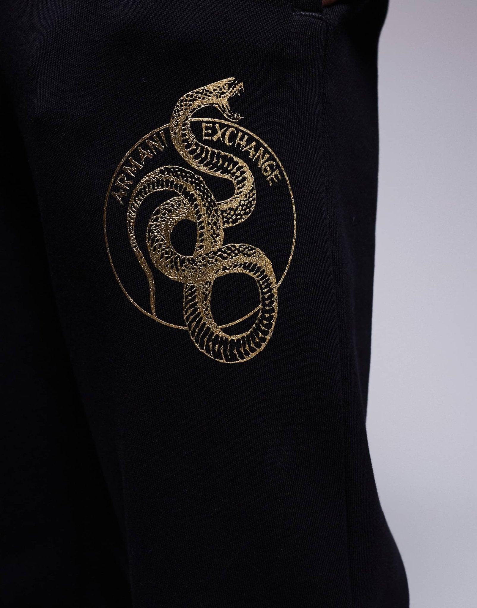 Armani Exchange lunar capsule snake joggers in black - ASOS Sample Sale EU Store