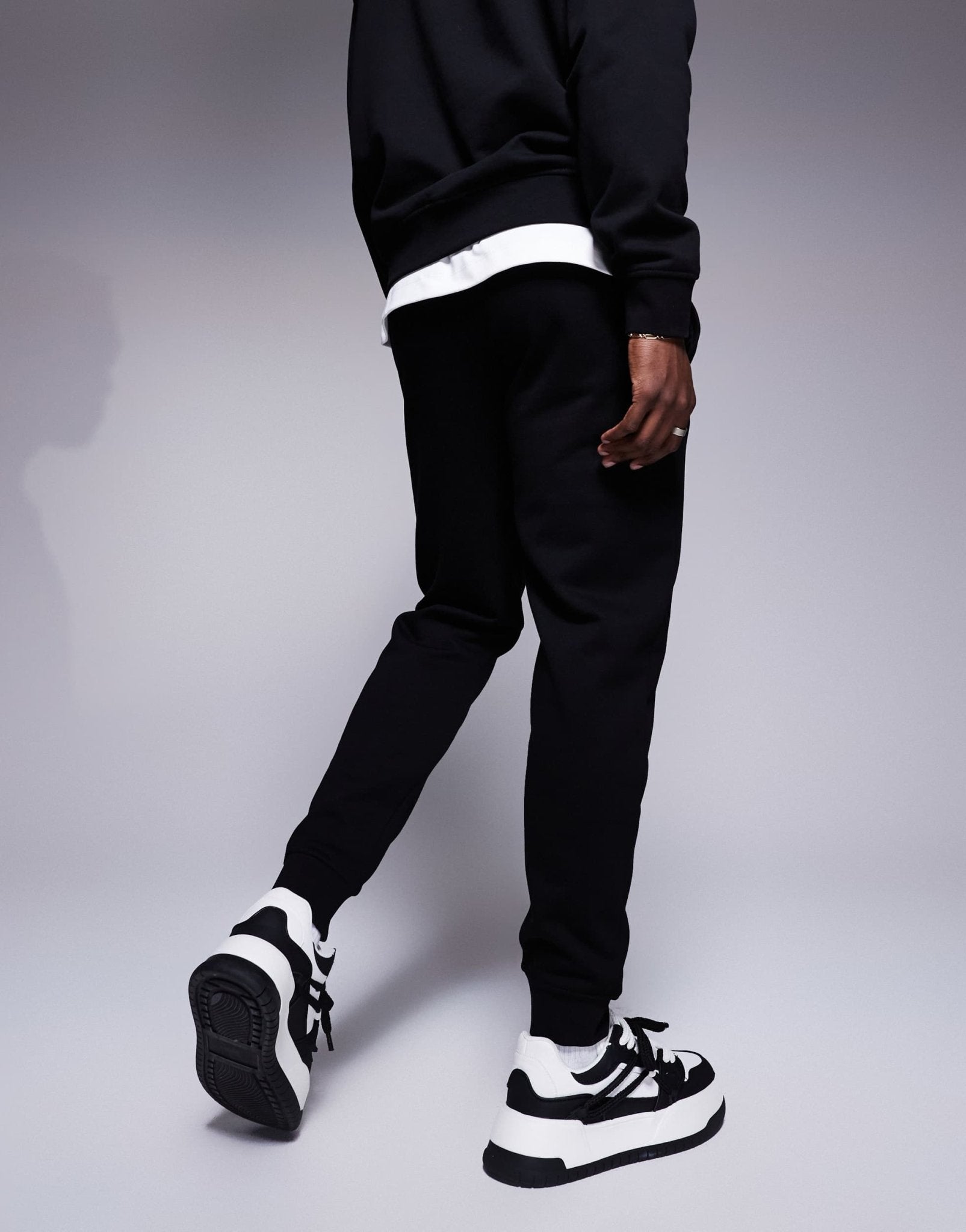 Armani Exchange lunar capsule snake joggers in black - ASOS Sample Sale EU Store