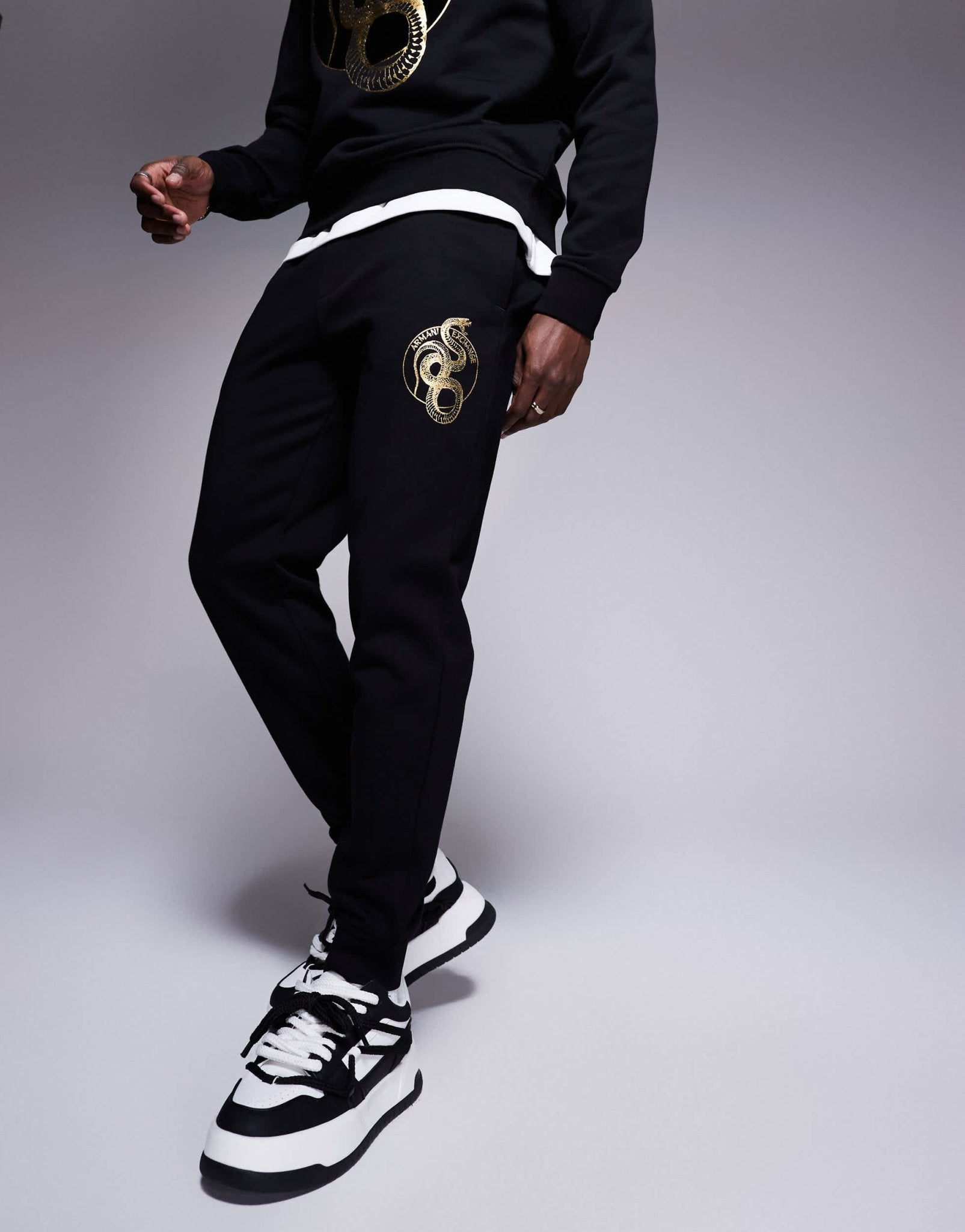 Armani Exchange lunar capsule snake joggers in black - ASOS Sample Sale EU Store