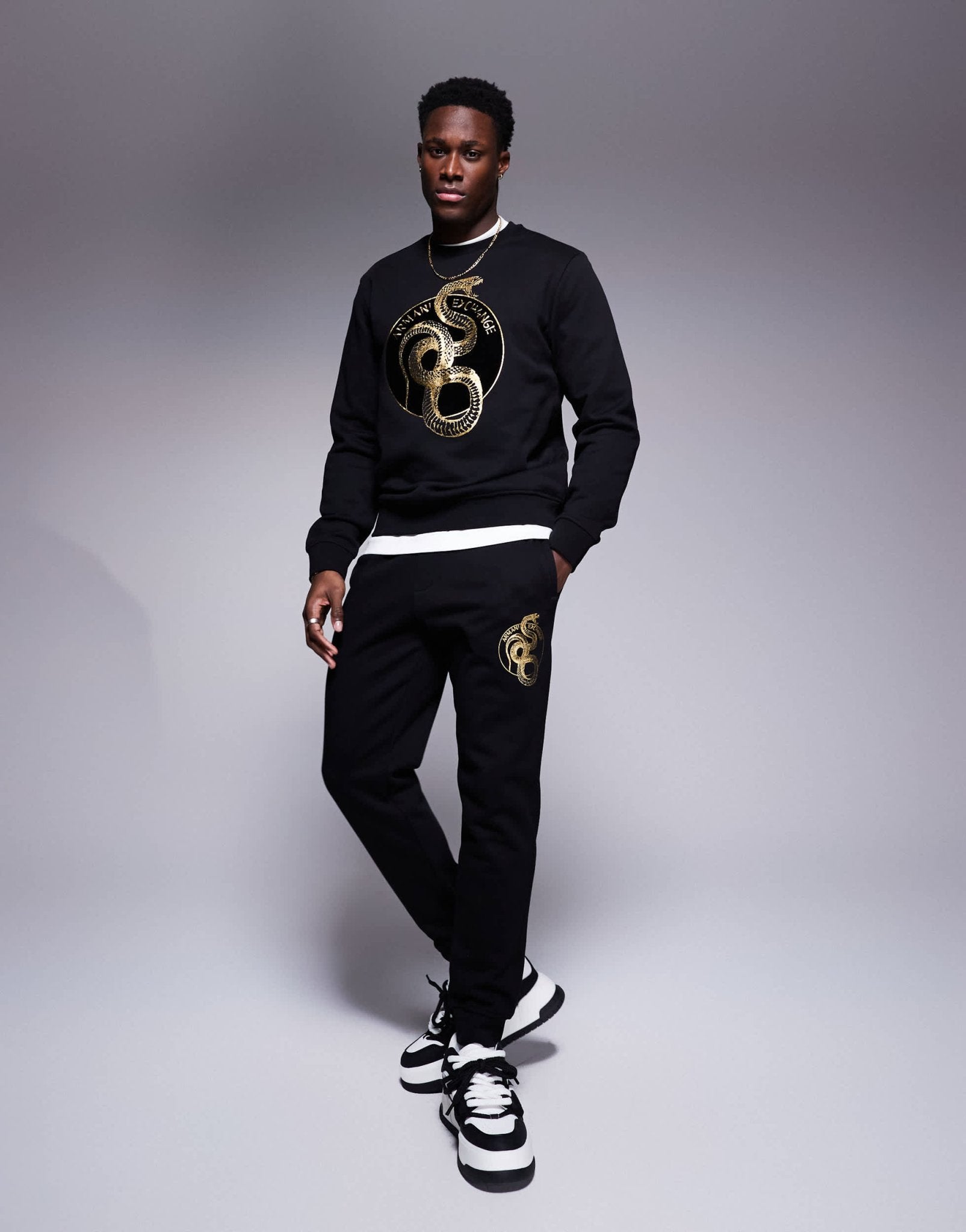 Armani Exchange lunar capsule snake joggers in black - ASOS Sample Sale EU Store