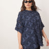 ARRANGE Curve woven textured oversized t-shirt in blue