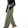 Pantaloni con zip e gamba ad arco ASOS DESIGN in kaki