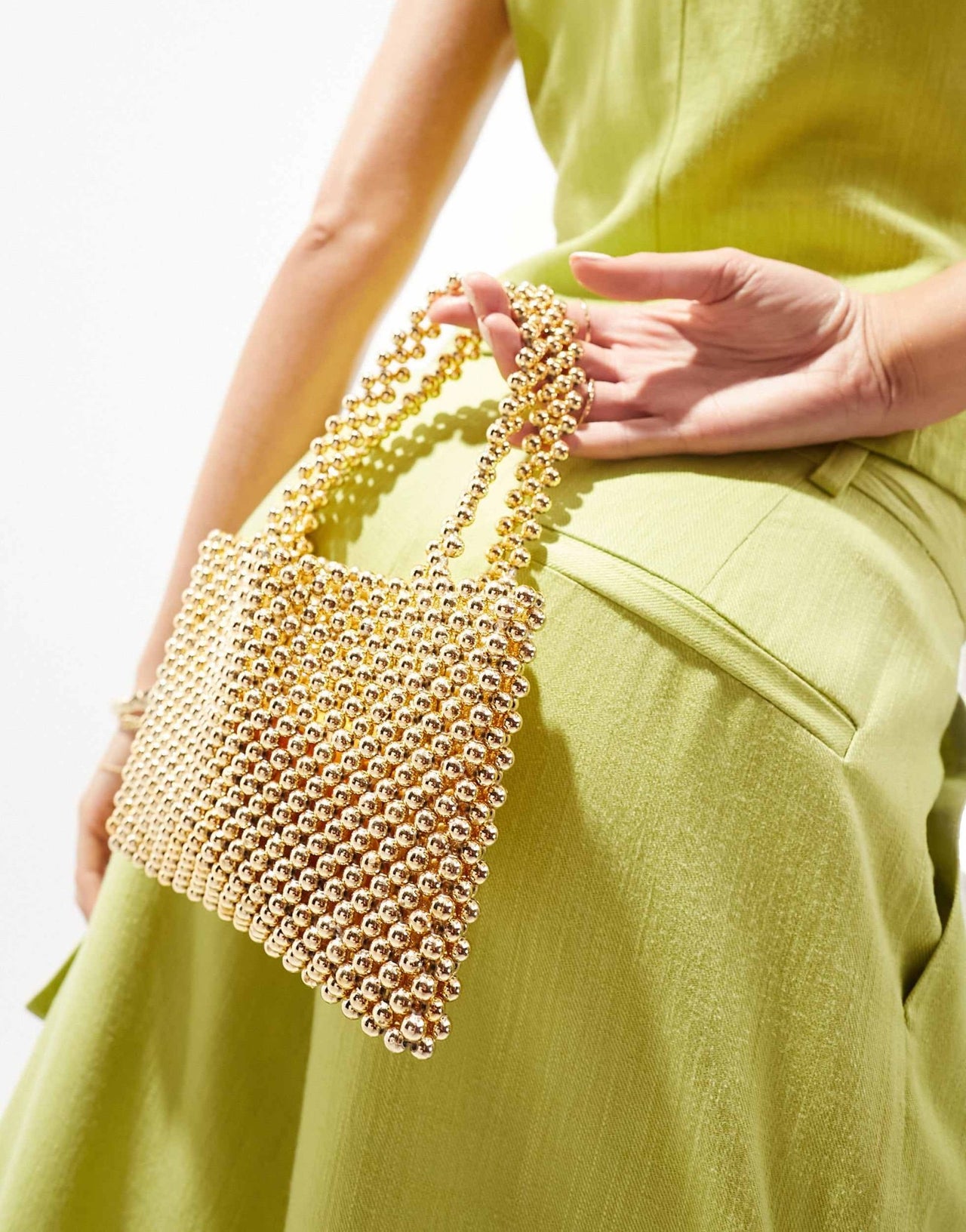 ASOS DESIGN beaded mini ball grab clutch bag in gold - ASOS Sample Sale EU Store