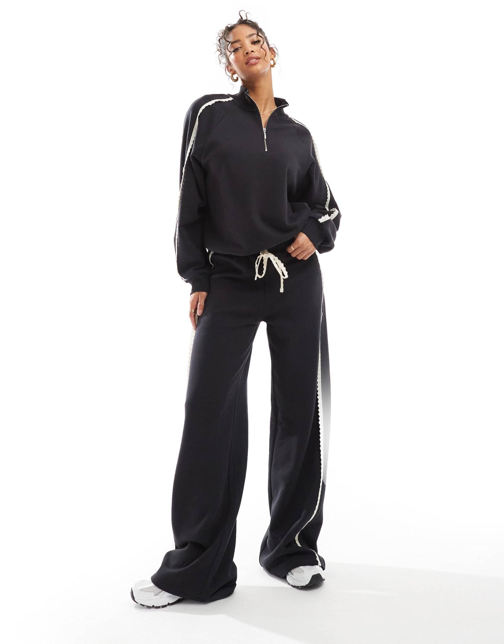 ASOS DESIGN broderie trim side stripe zip up top in black - ASOS Sample Sale EU Store