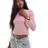 Top de manga larga con cuello alto y textura burbuja ASOS DESIGN en rosa rubor