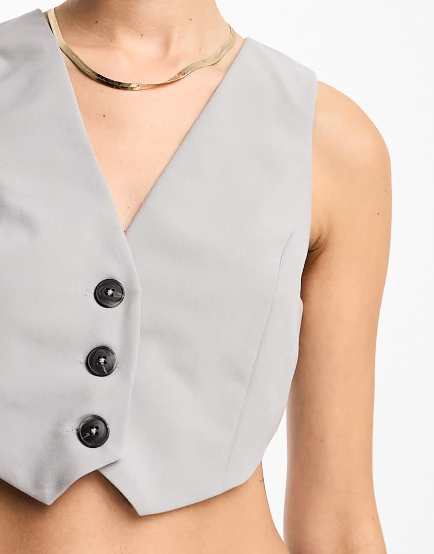 ASOS DESIGN cropped waistcoat with contrast buttons in light grey - ASOS Sample Sale EU Store