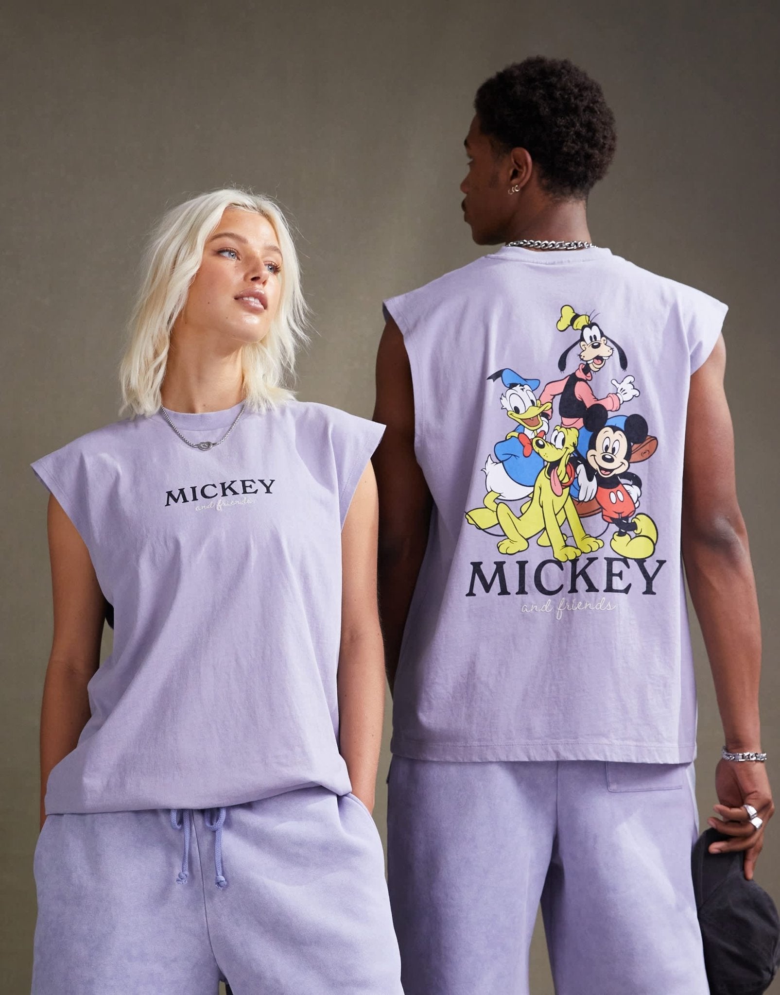ASOS DESIGN Disney unisex oversized vest with Mickey Mouse & Friends prints in washed purple - ASOS Sample Sale EU Store