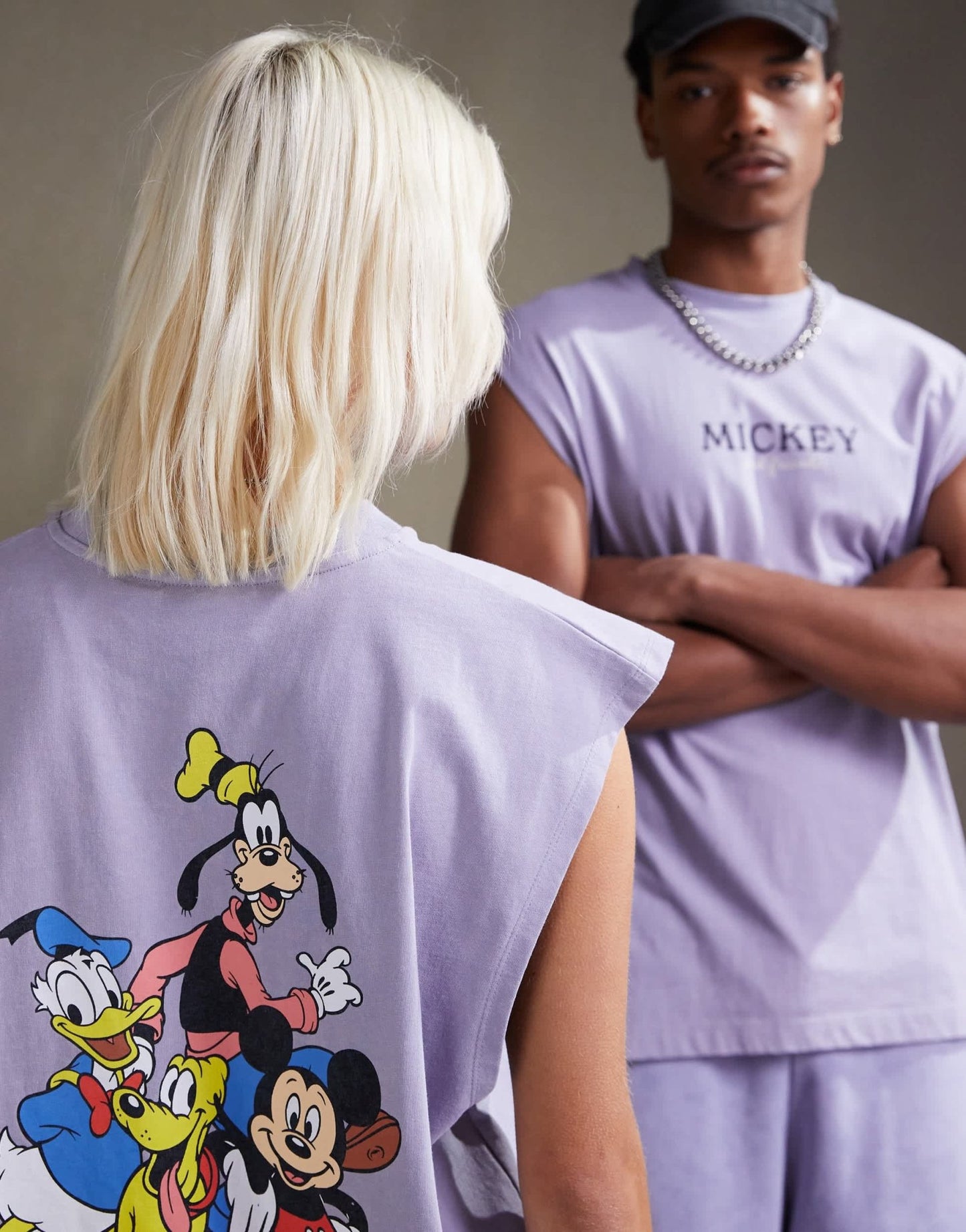 ASOS DESIGN Disney unisex oversized vest with Mickey Mouse & Friends prints in washed purple - ASOS Sample Sale EU Store
