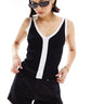 ASOS DESIGN knitted v neck vest in black with contrast white trim