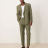 Pantaloni da completo svasati in misto lino ASOS DESIGN in verde - MGREEN
