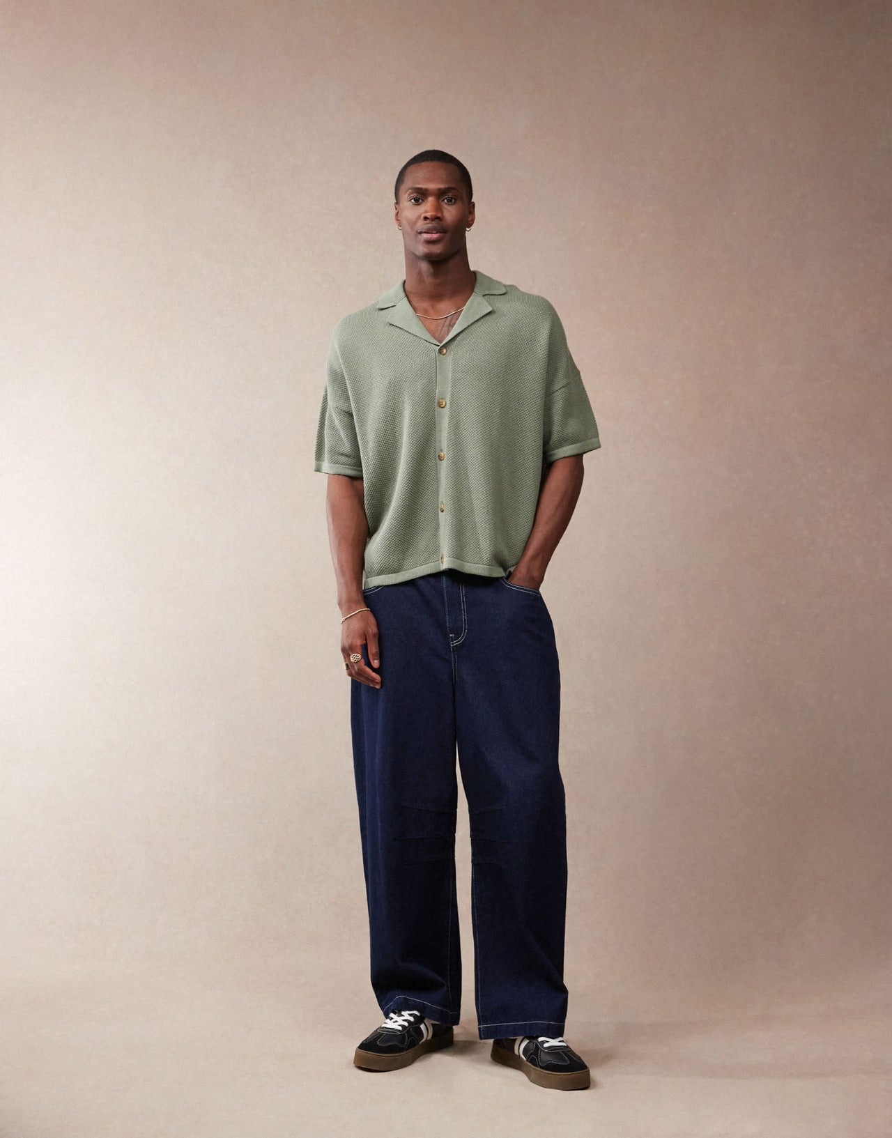 ASOS DESIGN oversized fit knitted texture revere neck button through polo in green - ASOS Sample Sale EU Store