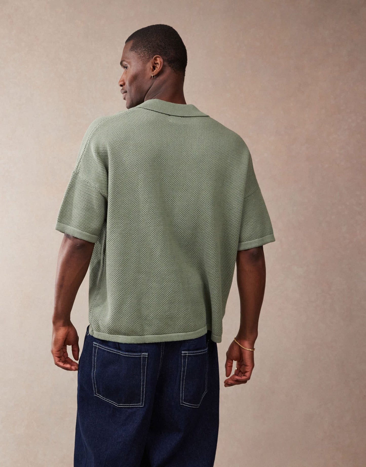 ASOS DESIGN oversized fit knitted texture revere neck button through polo in green - ASOS Sample Sale EU Store