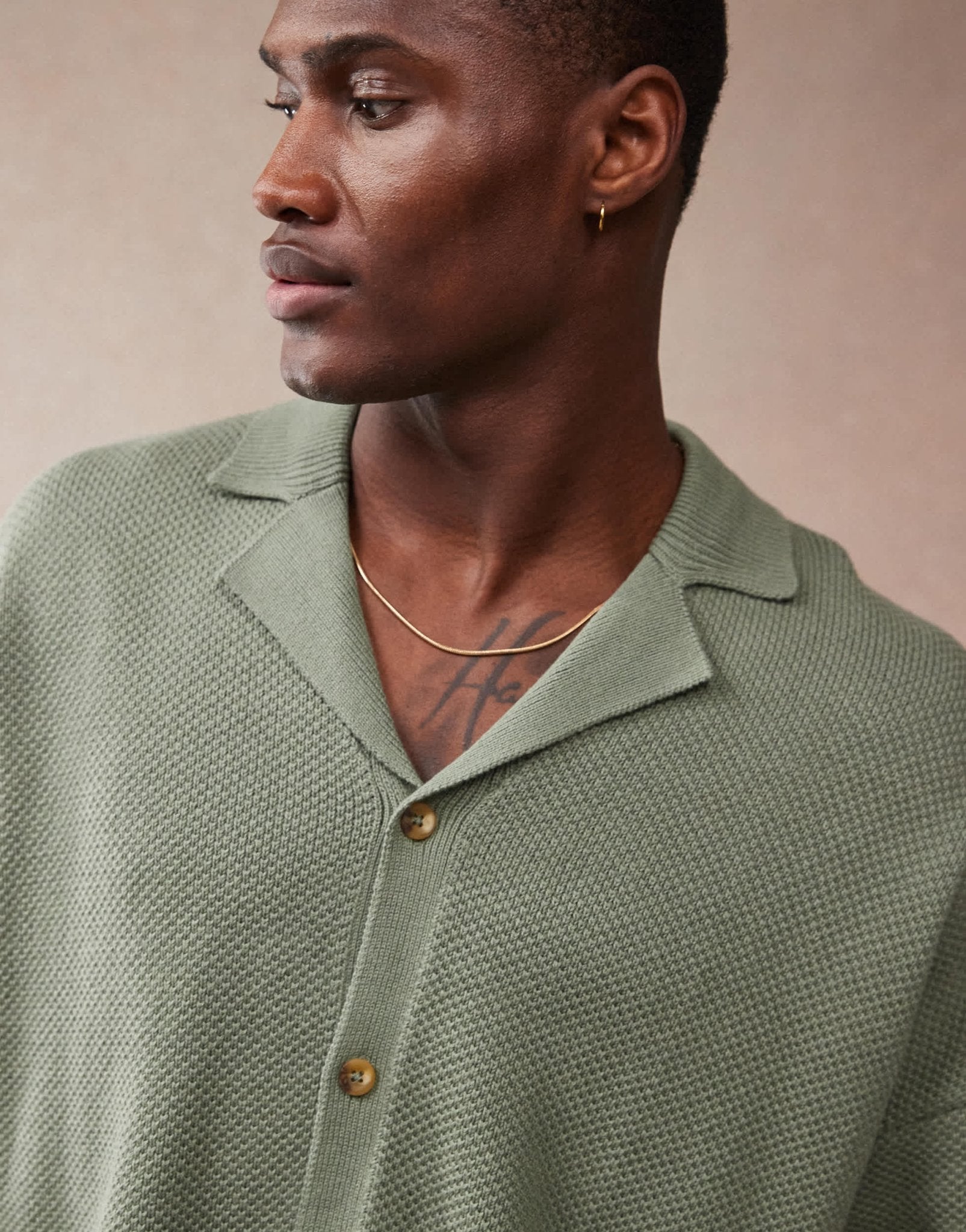 ASOS DESIGN oversized fit knitted texture revere neck button through polo in green - ASOS Sample Sale EU Store