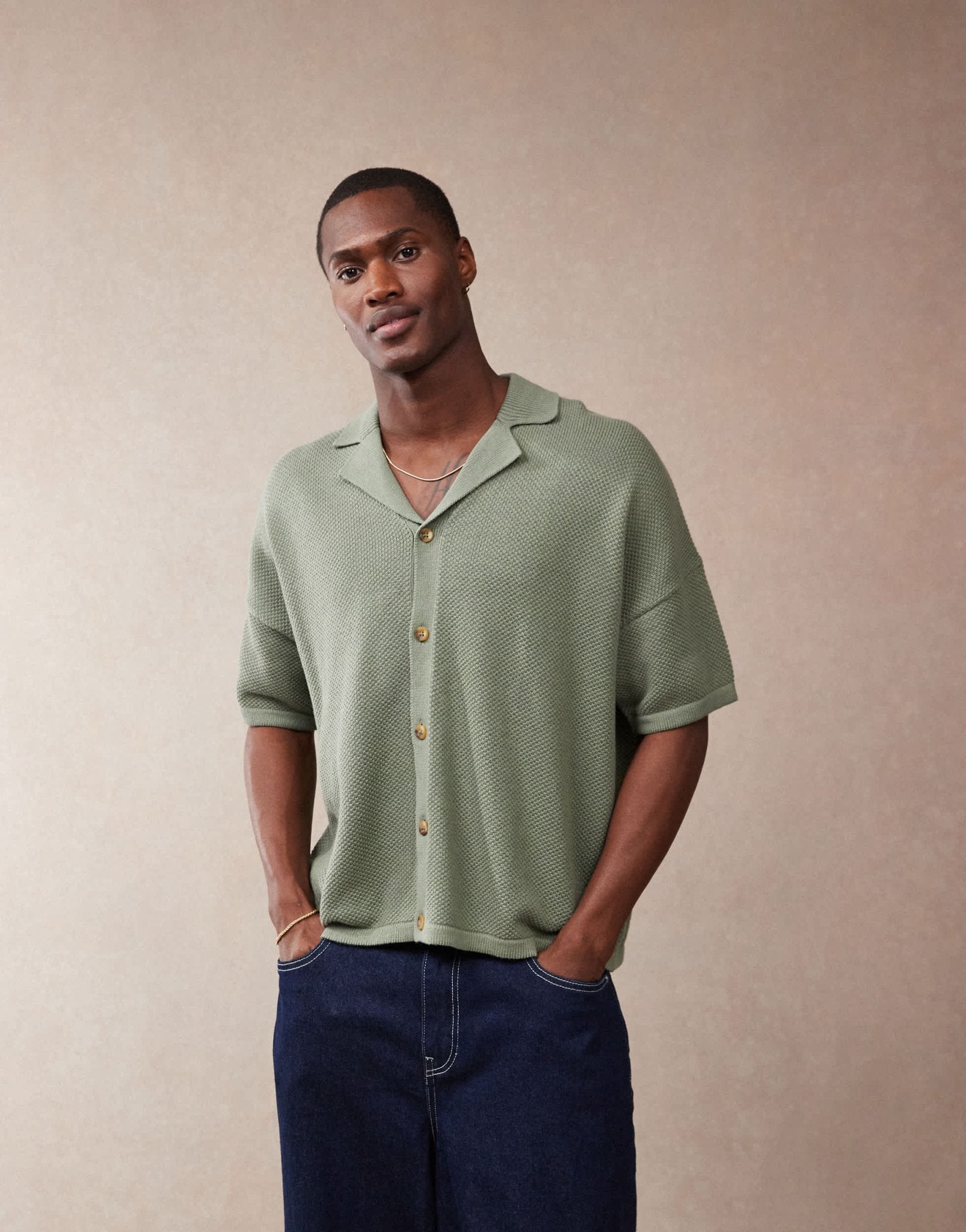 ASOS DESIGN oversized fit knitted texture revere neck button through polo in green - ASOS Sample Sale EU Store