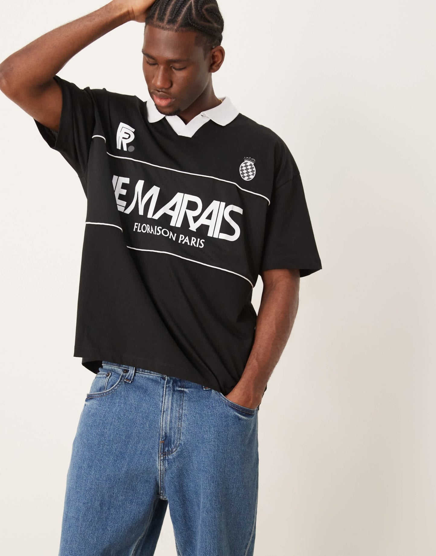 ASOS DESIGN oversized polo with football graphic in black - ASOS Sample Sale EU Store