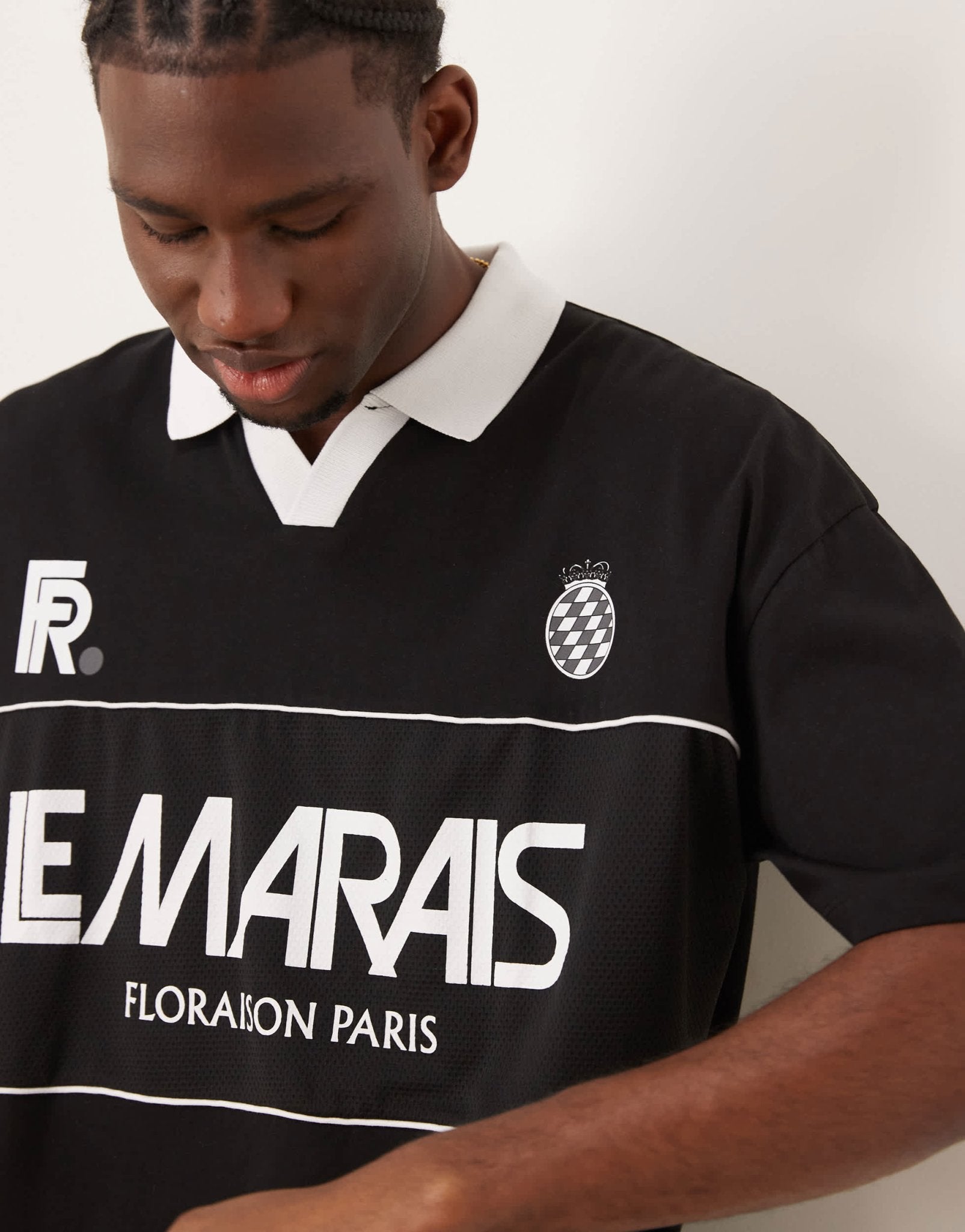 ASOS DESIGN oversized polo with football graphic in black - ASOS Sample Sale EU Store