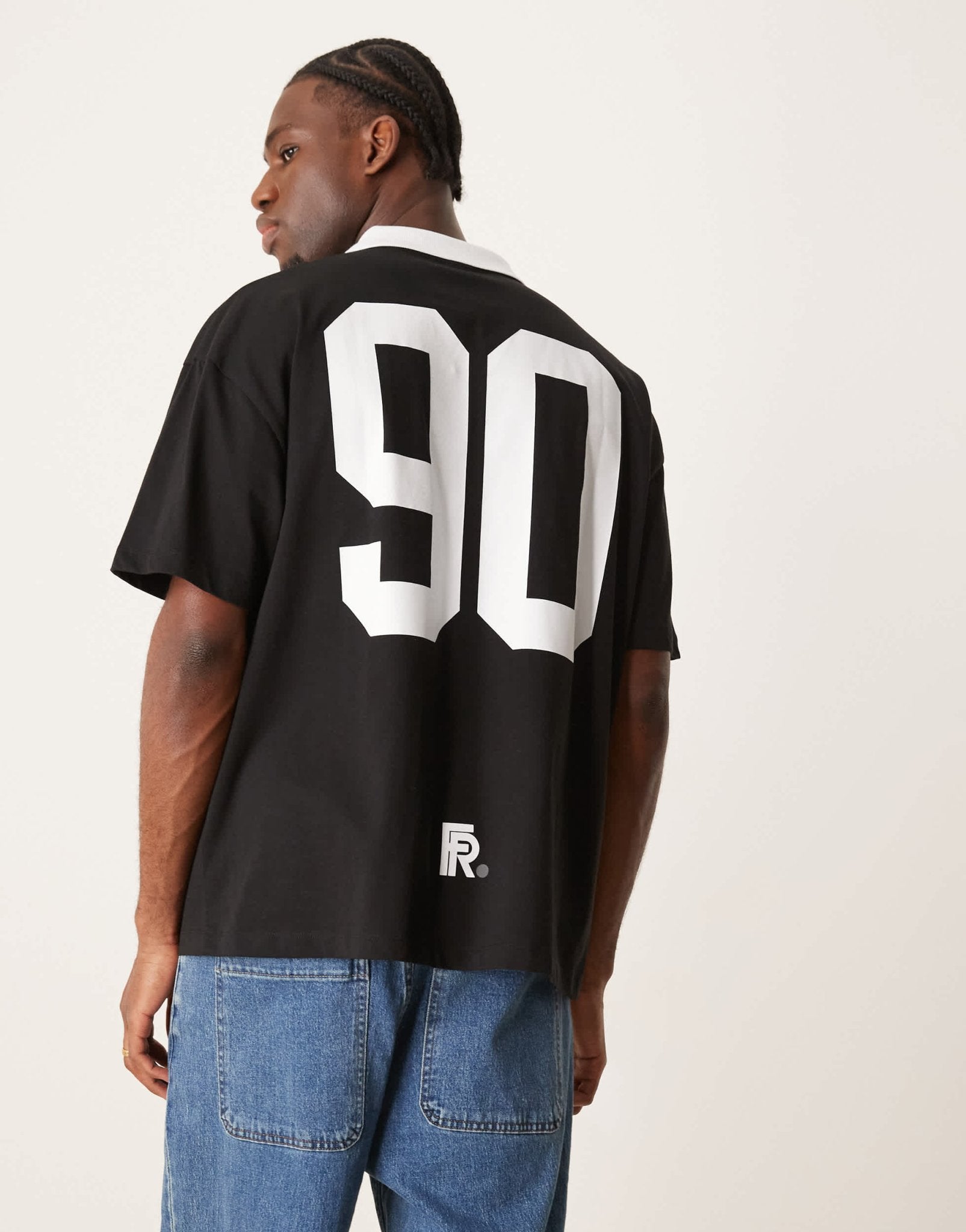 ASOS DESIGN oversized polo with football graphic in black - ASOS Sample Sale EU Store