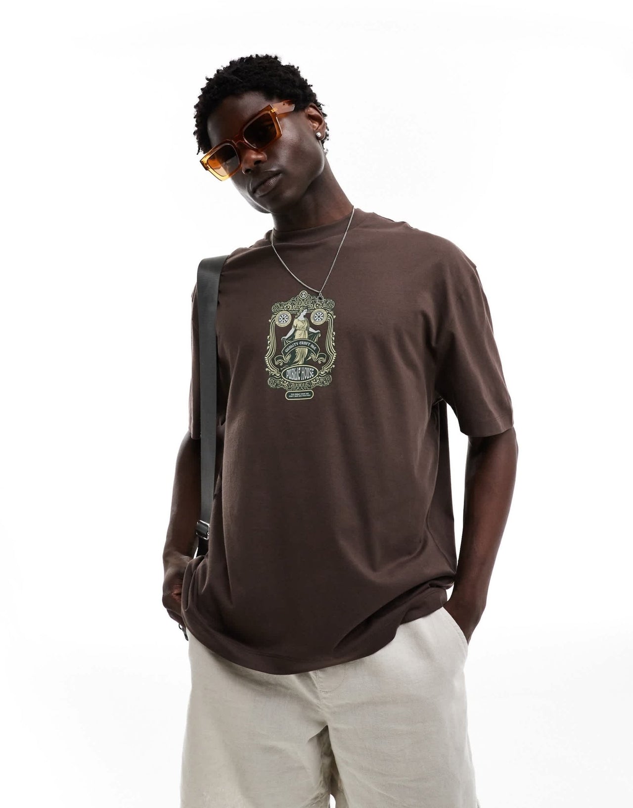 ASOS DESIGN oversized t-shirt in brown with emblem chest print - ASOS Sample Sale EU Store