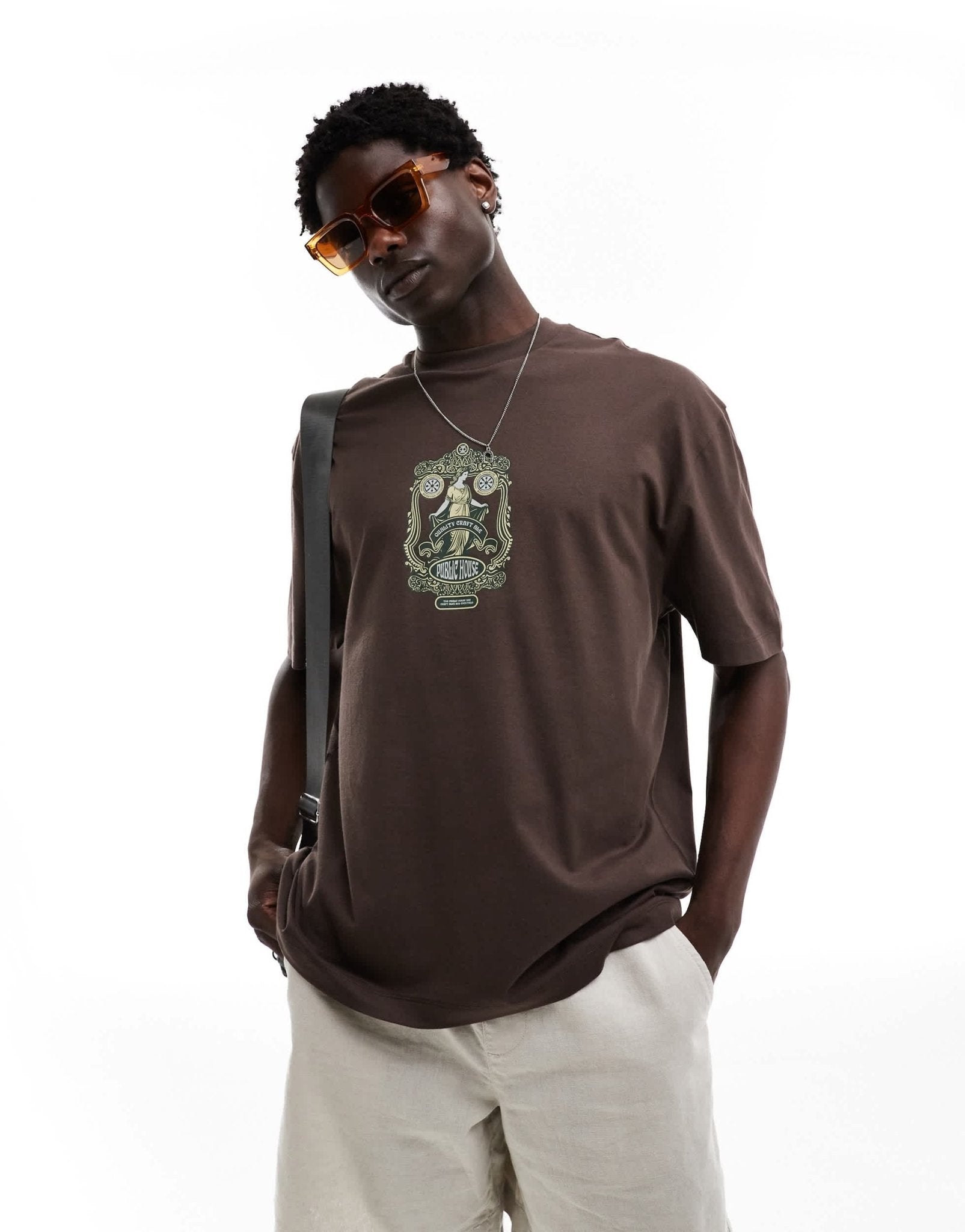 ASOS DESIGN oversized t-shirt in brown with emblem chest print - ASOS Sample Sale EU Store