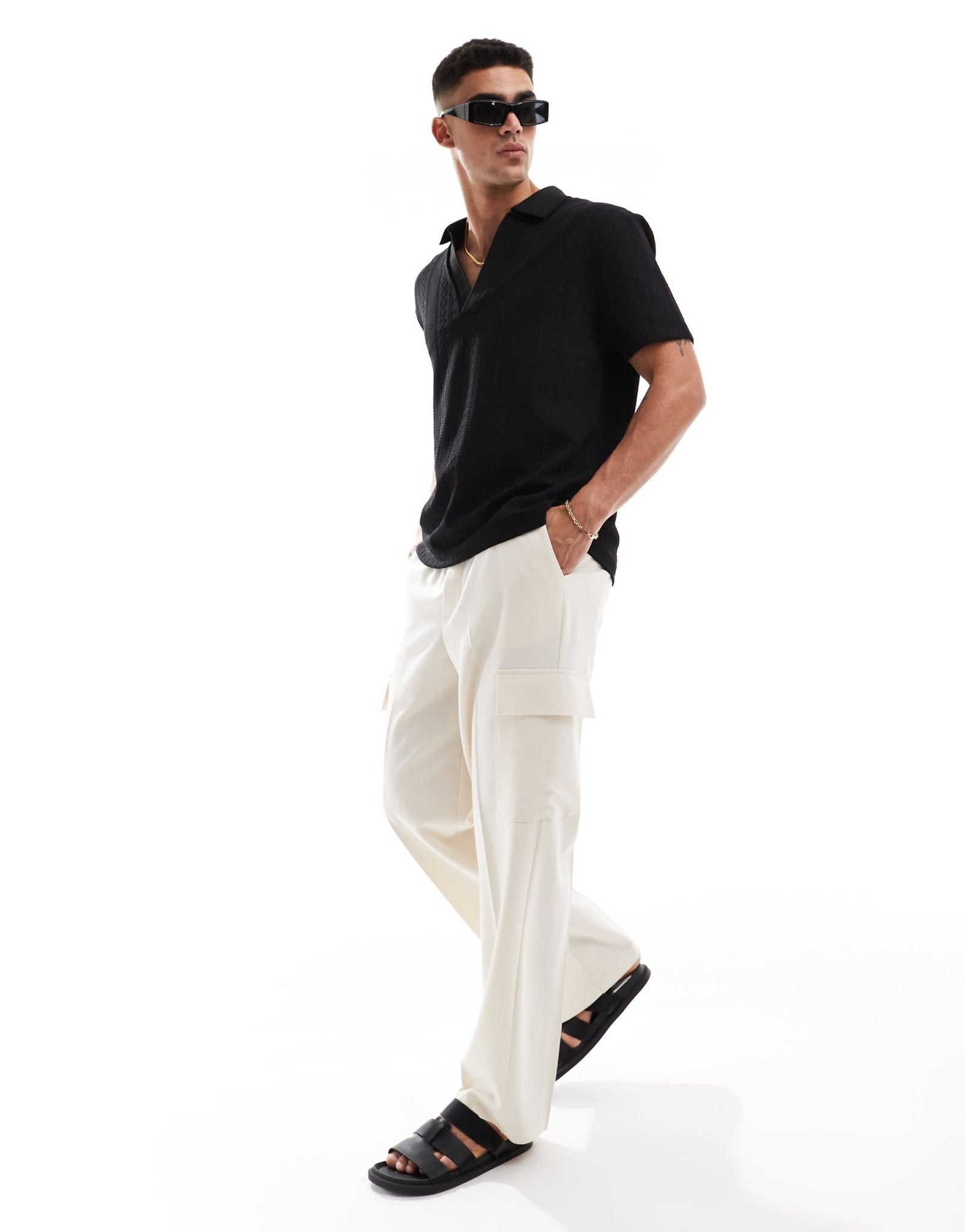 ASOS DESIGN oversized textured polo with revere neck in black - ASOS Sample Sale EU Store