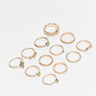 ASOS DESIGN pack of 12 rings in worn gold tone