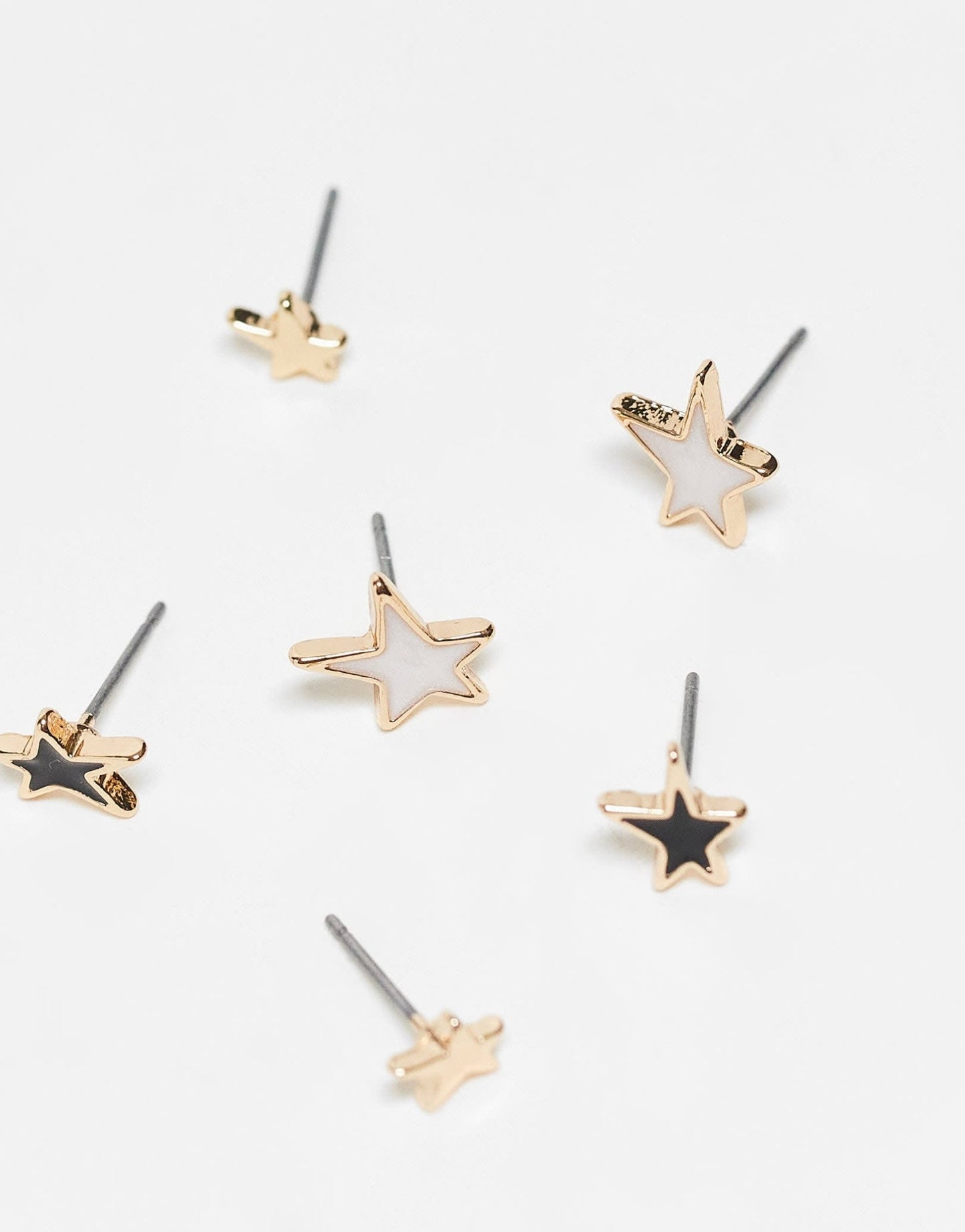 ASOS DESIGN pack of 3 stud earrings with faux pearl and black enamel star design in gold tone - ASOS Sample Sale EU Store