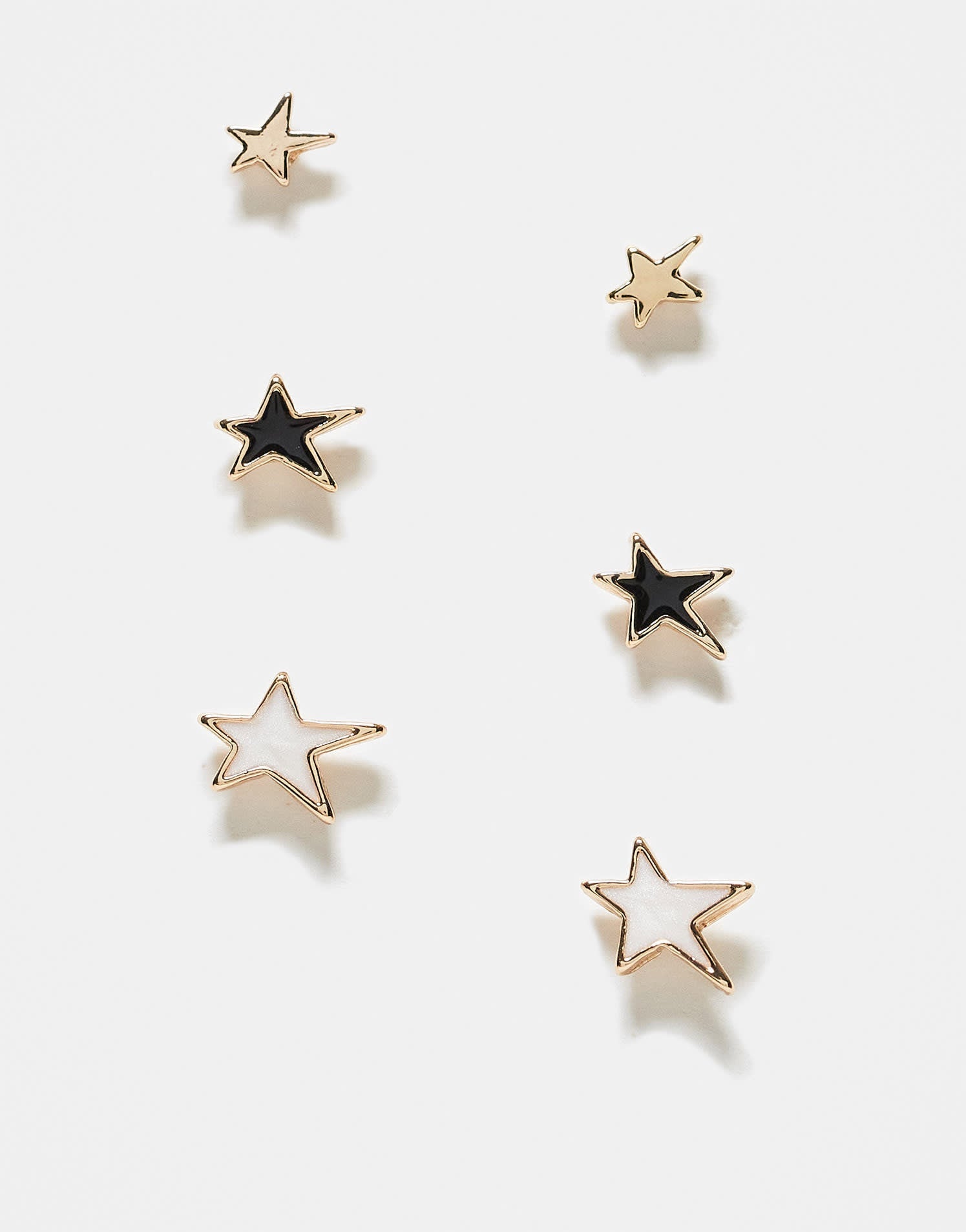 ASOS DESIGN pack of 3 stud earrings with faux pearl and black enamel star design in gold tone - ASOS Sample Sale EU Store