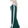 ASOS DESIGN pull on trousers with contrast panel in forest green