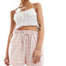 ASOS DESIGN short with ruffle detail in pink gingham
