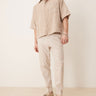 ASOS DESIGN pantaloni smart tapered fit in misto lino color pietra con risvolti