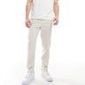 ASOS DESIGN smart tapered fit trousers in ecru microtexture