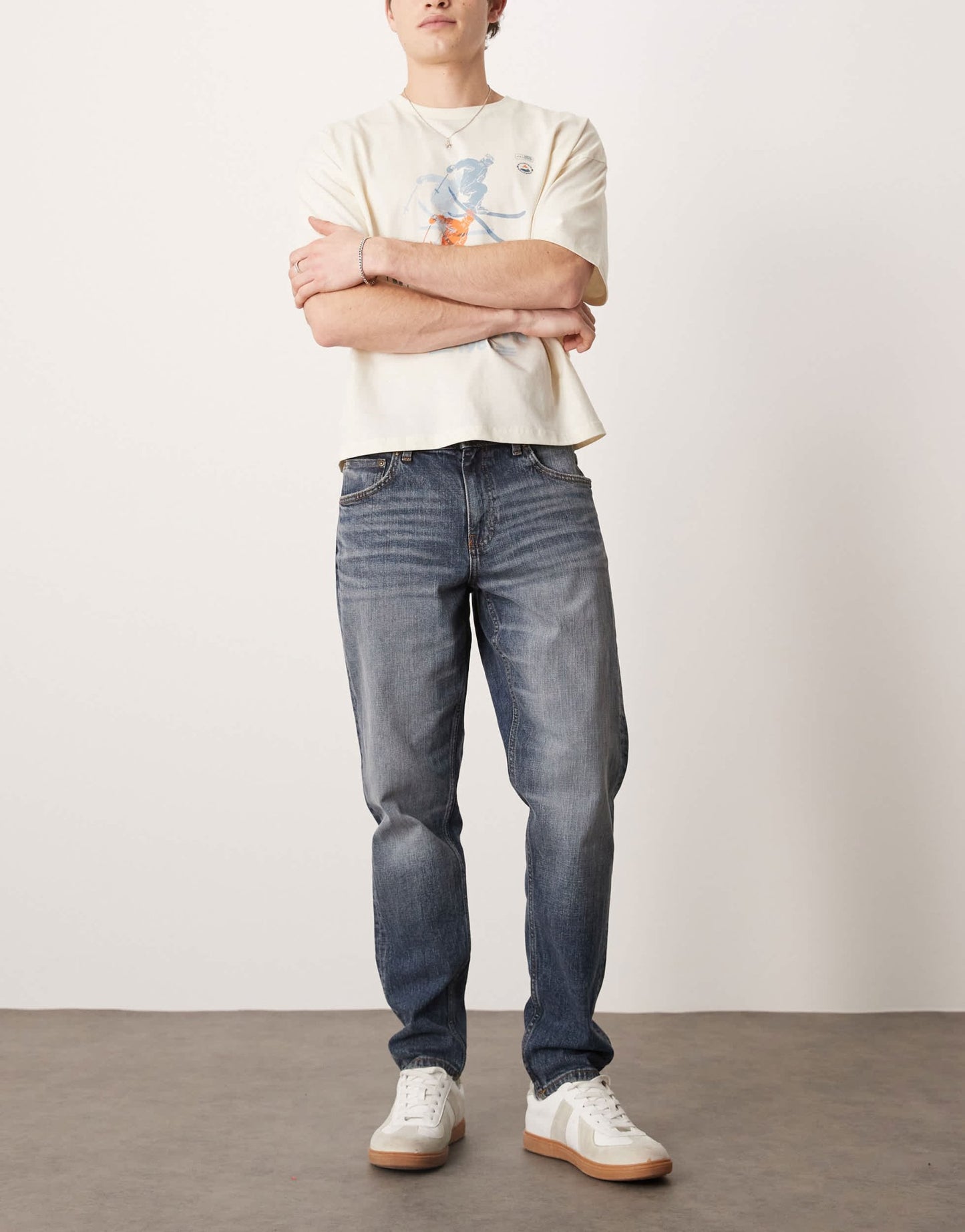 ASOS DESIGN stretch tapered jeans in mid wash blue - ASOS Sample Sale EU Store