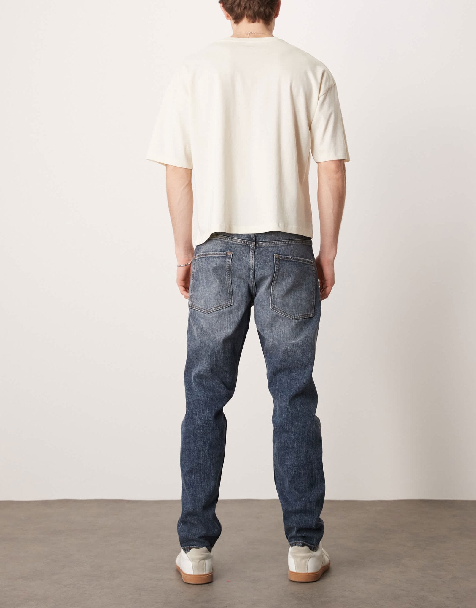 ASOS DESIGN stretch tapered jeans in mid wash blue - ASOS Sample Sale EU Store