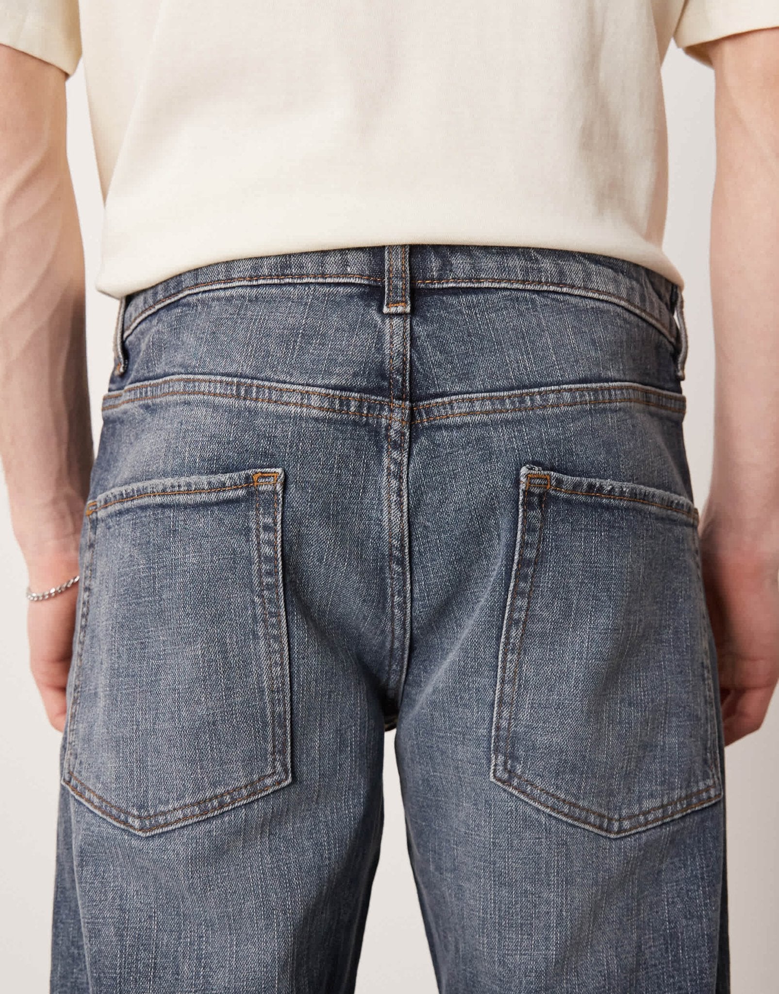 ASOS DESIGN stretch tapered jeans in mid wash blue - ASOS Sample Sale EU Store