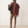 Bañador tipo slip ASOS DESIGN en marrón